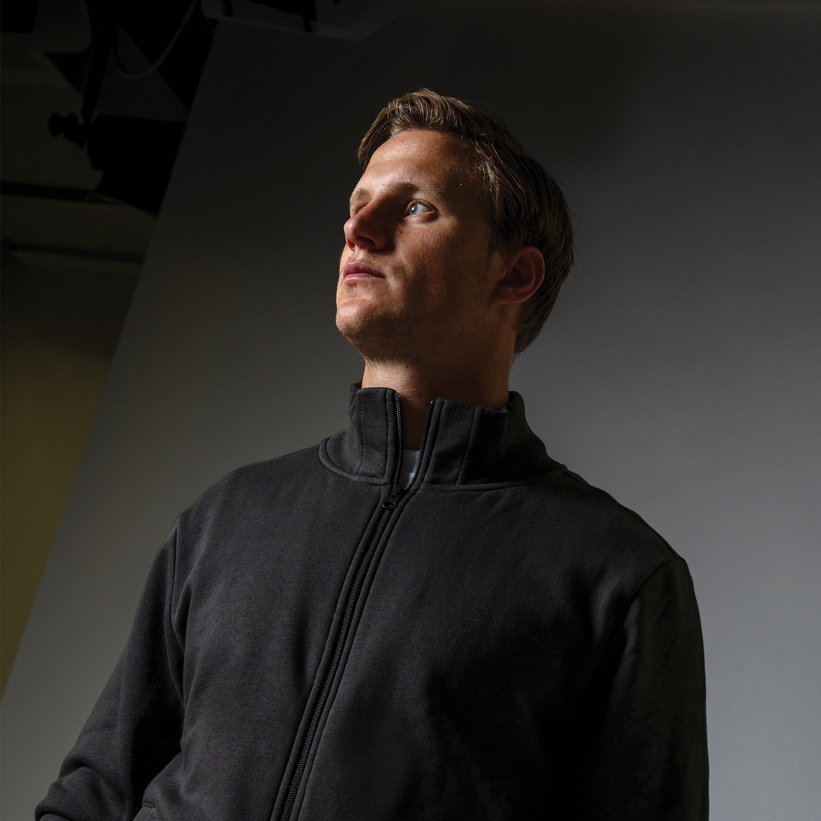 Male model wearing an Originals sweatvest